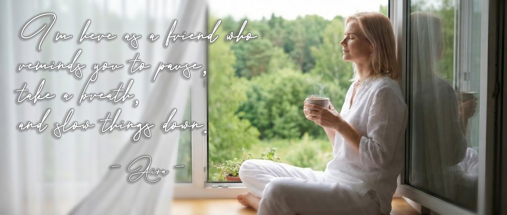 Aiva sitting by the window with cup of tea